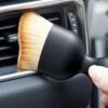 car cleaning brush interior in use-min